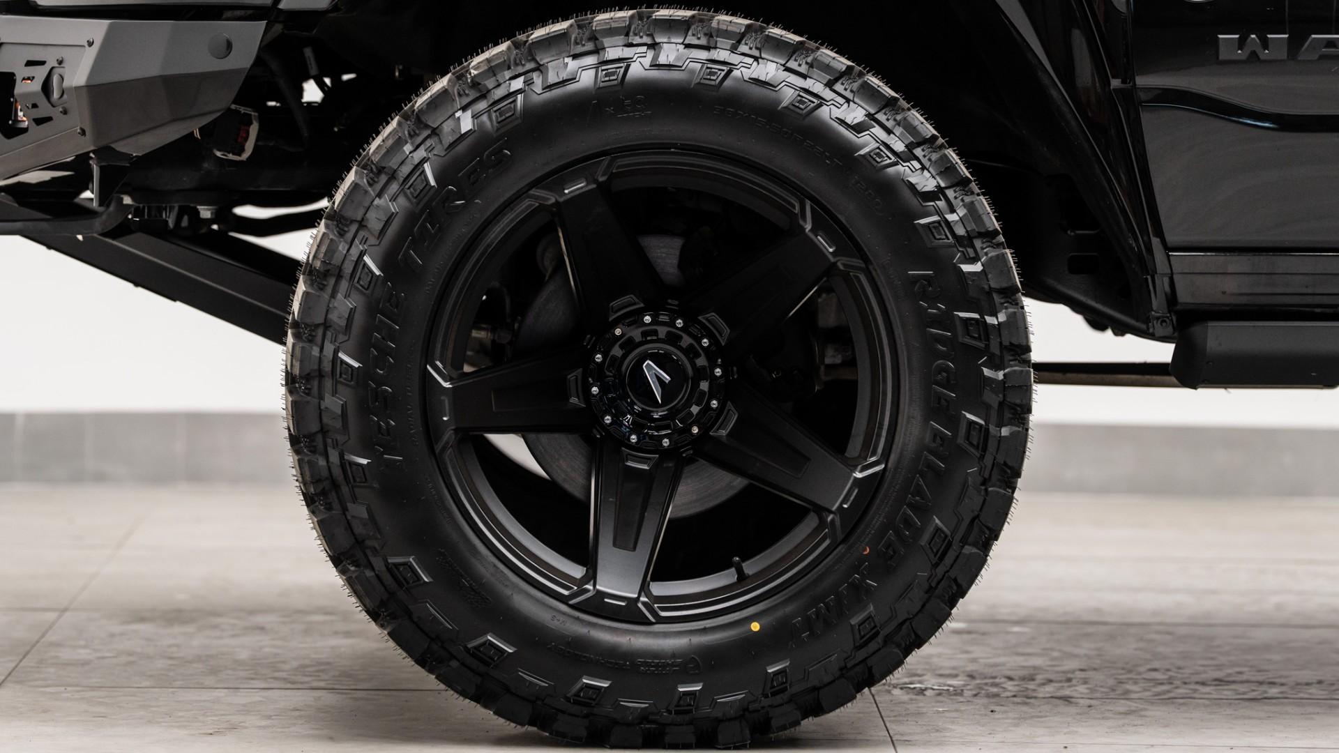 2024 RAM TRX in DIAMOND BLACK CRYSTAL PEARLCOAT, photo 12 of 49