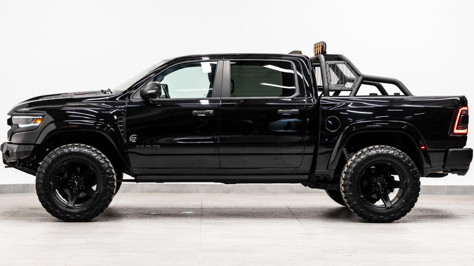 2024 RAM TRX in DIAMOND BLACK CRYSTAL PEARLCOAT, photo 11 of 49
