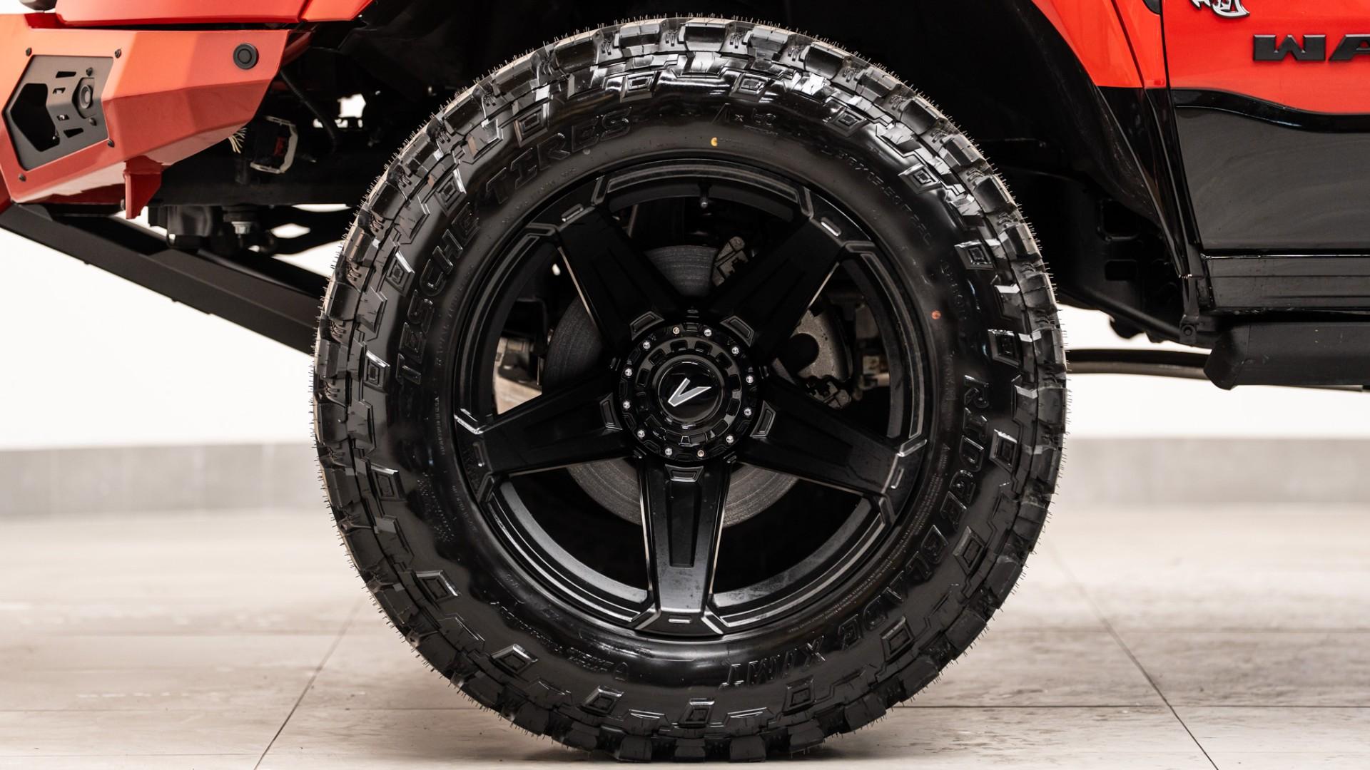 2024 RAM TRX in FLAME RED CLEARCOAT, photo 13 of 57