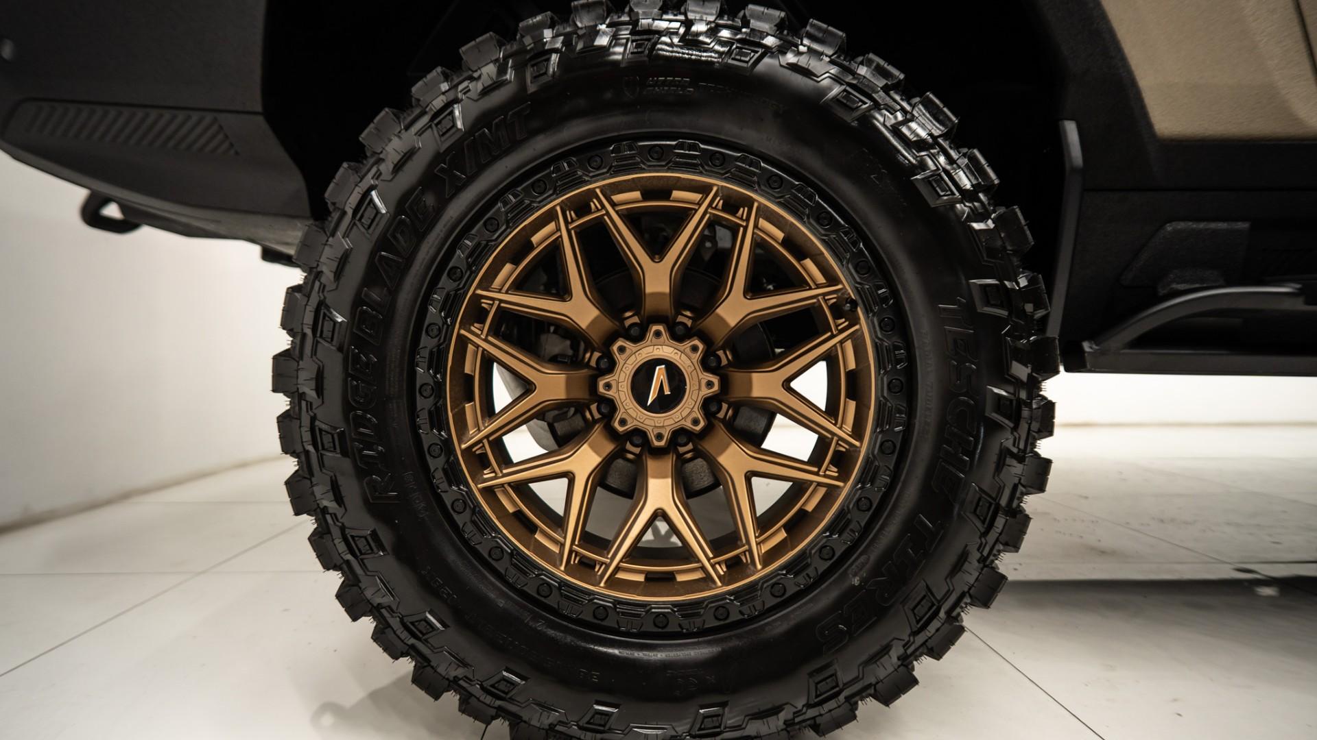 2023 GMC HUMMER EV 3X in Tan, photo 9 of 52