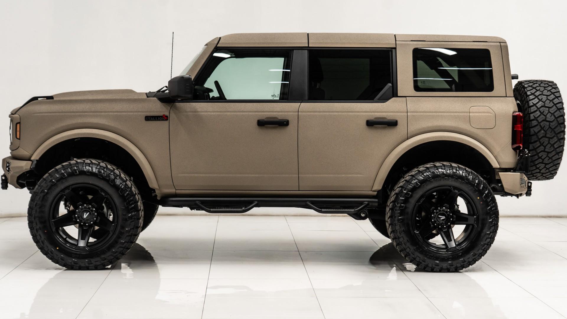 2025 FORD BRONCO in Tan, photo 14 of 53