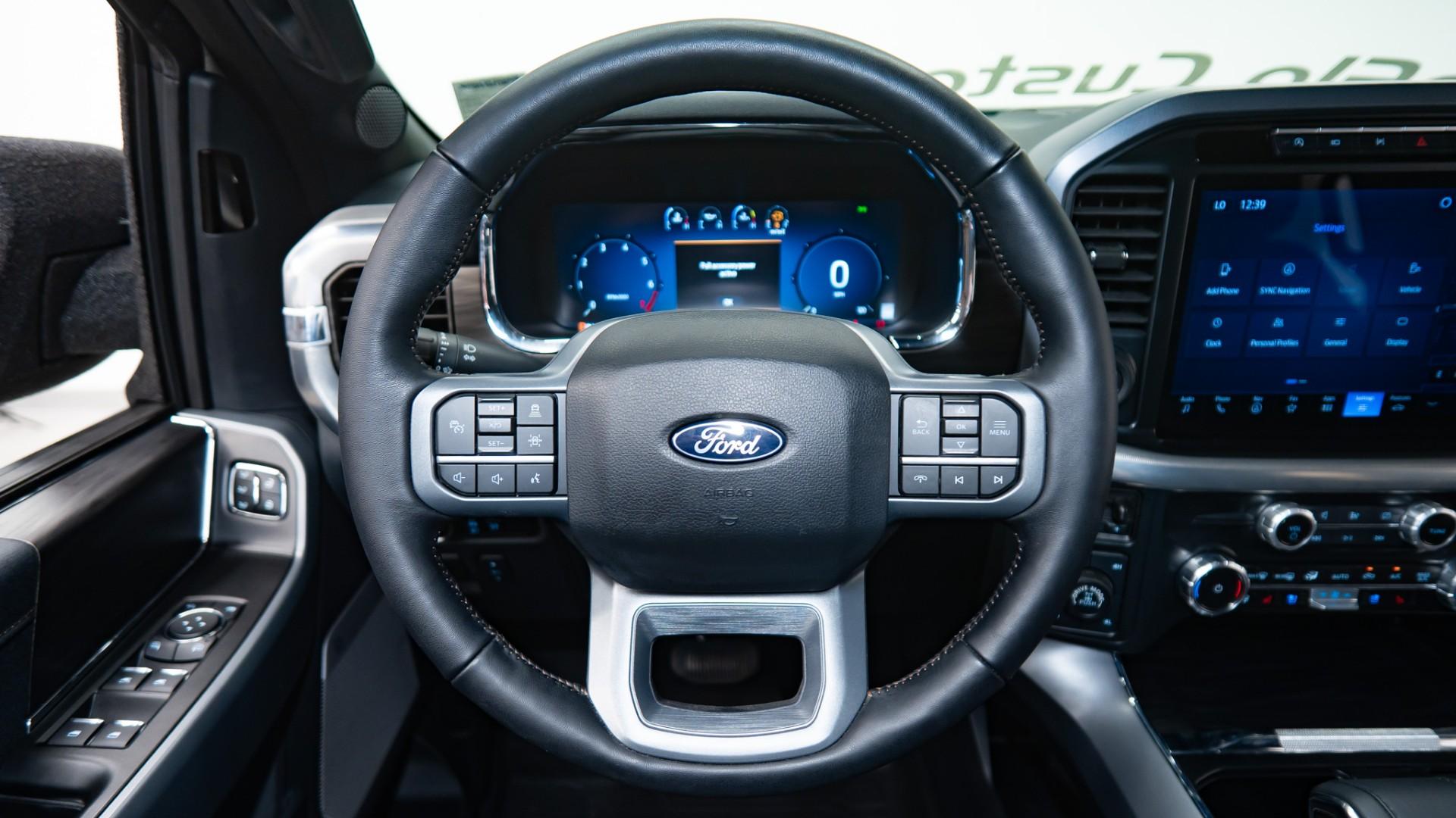 2024 FORD F-150 LARIAT in Tan, photo 14 of 33