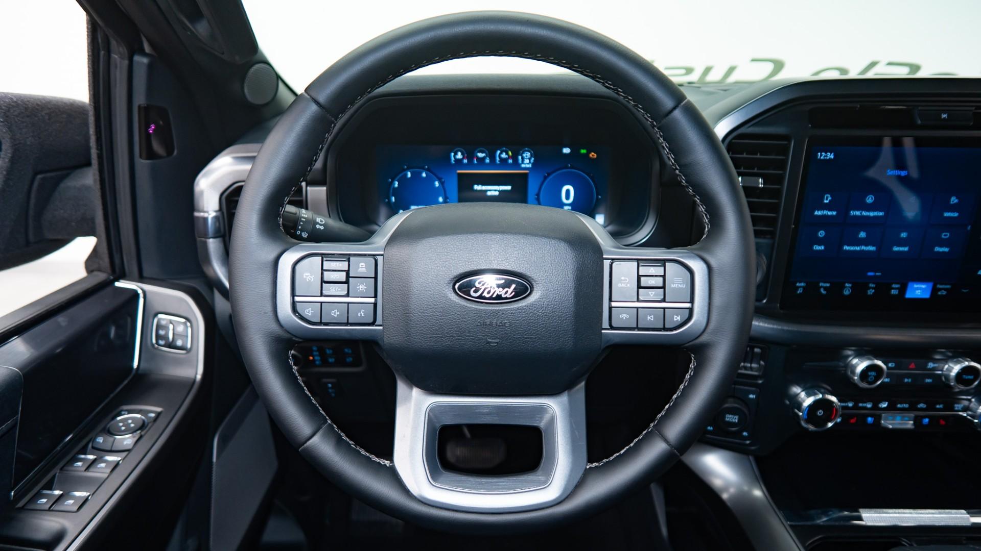 2025 FORD F-150 LARIAT in Tan, photo 32 of 43